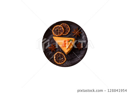 A slice of yellow cheesecake cake flavored with lemon and passion fruit A slice of yellow cheesecake cake flavored with lemon and passion fruit 128841954