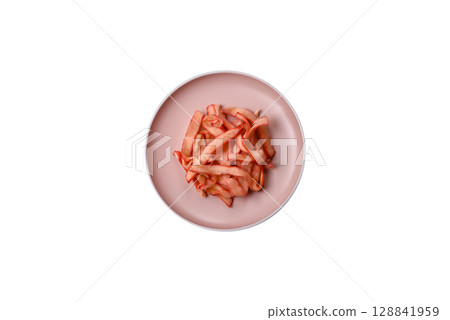 Food, dried squid in shavings or chopped as snacks or jerky. Snack dried squid for beer Food, dried squid in shavings or chopped as snacks or jerky. Snack dried squid for beer 128841959