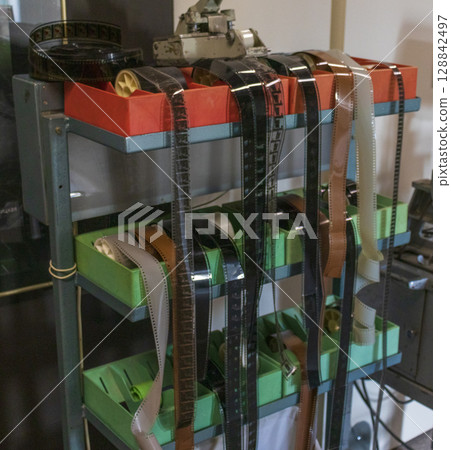 Shot of the old, processed film reels 128842497