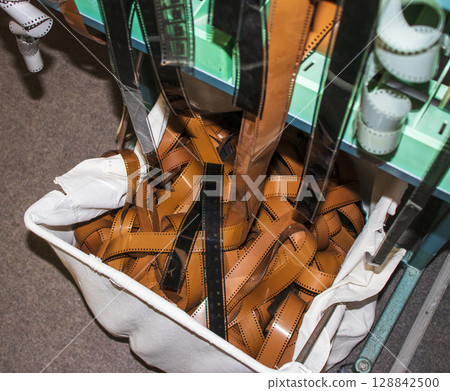 Shot of the old, processed film reels 128842500
