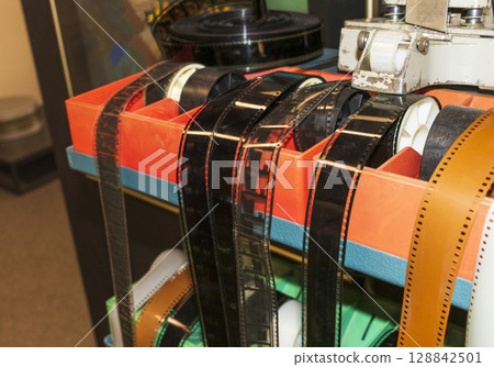 Shot of the old, processed film reels 128842501