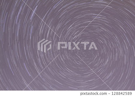 A view of the stars of the Milky Way with a mountain top in the foreground.Perseid Meteor Shower observation A view of the stars of the Milky Way with a mountain top in the foreground.Perseid Meteor Shower observation 128842589