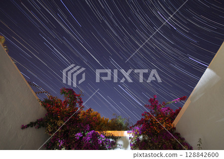 A view of the stars of the Milky Way with a mountain top in the foreground.Perseid Meteor Shower observation A view of the stars of the Milky Way with a mountain top in the foreground.Perseid Meteor Shower observation 128842600