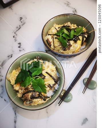 Eel and egg dish 128845096