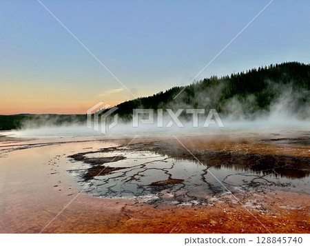 Grand Prismatic Spring glowing in the evening sun, Yellowstone National Park Grand Prismatic Spring glowing in the evening sun, Yellowstone National Park 128845740