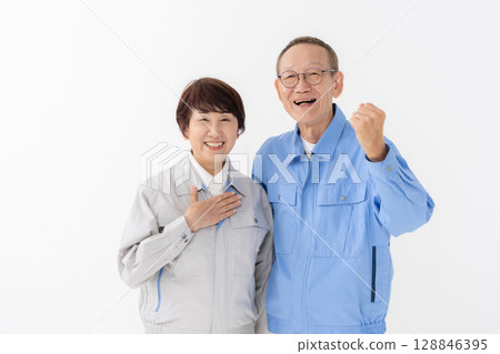 Men and women in work clothes 128846395