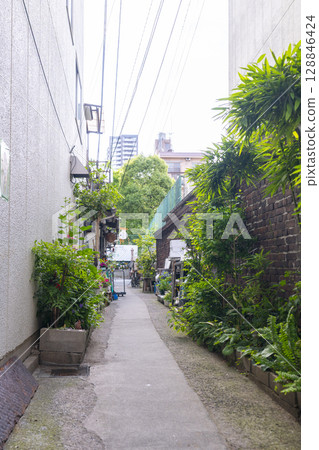 A row of houses in an alley at Kuromon Market in Nihonbashi, Osaka A row of houses in an alley at Kuromon Market in Nihonbashi, Osaka 128846424