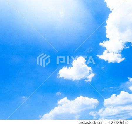 A simple landscape of a refreshing blue sky and white clouds 128846481
