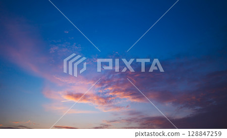 Clouds and blue sky dyed in the sunset - High saturation matte finish Clouds and blue sky dyed in the sunset - High saturation matte finish 128847259
