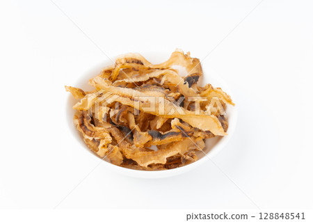 Scallops on a plate on a white background Scallops on a plate on a white background 128848541