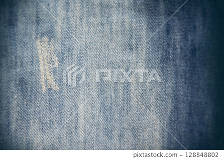 old blue jeans. denim jeans texture background old blue jeans. denim jeans texture background 128848802