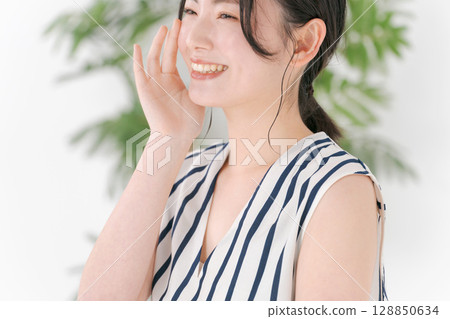 A young woman doing skin care A young woman doing skin care 128850634