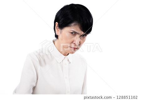 Glaring senior woman Glaring senior woman 128851102
