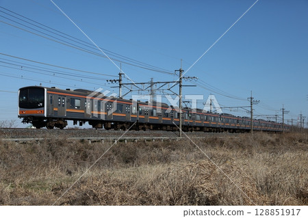 205 series M35 train running on the Musashino Line on a clear day 128851917