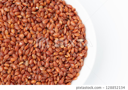 Close-up of red rice in a plate 128852134