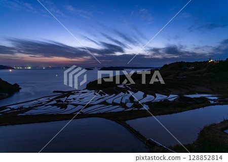 Nagasaki Prefecture: Tsuchiya rice terraces at dusk - a pristine Japanese landscape Nagasaki Prefecture: Tsuchiya rice terraces at dusk - a pristine Japanese landscape 128852814