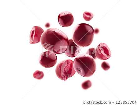 Red cherry berries levitate on a white background Red cherry berries levitate on a white background 128853704