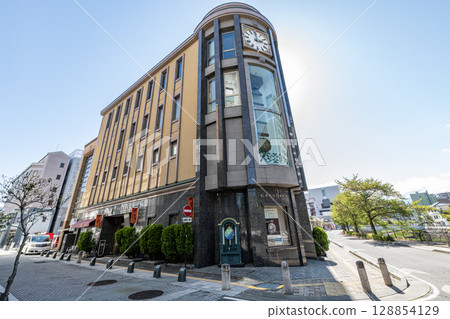 Matsumoto City Clock Museum on a sunny day, famous for its collection of antique clocks in Matsumoto City, Nagano Prefecture 128854129