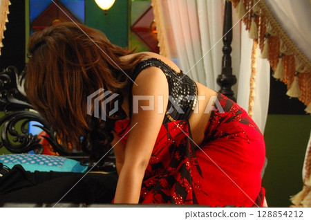 Indian traditional Female in saree Indian traditional Female in saree 128854212