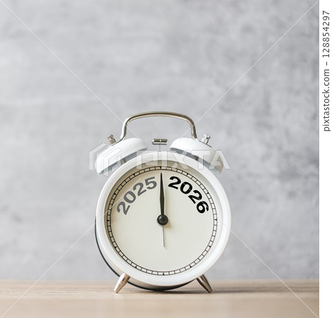 Happy New Year with vintage alarm clock and 2025 change to 2026 number. Merry Christmas, New Start, Resolution, countdown, Goals, Plan, Action and Mission Concept 128854297