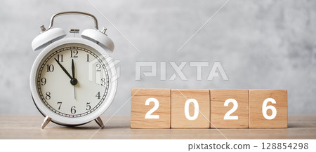 Happy New Year with vintage alarm clock and 2026  block. Christmas, New Start, Resolution, countdown, Goals, Plan, Action and Motivation Concept Happy New Year with vintage alarm clock and 2026  block. Christmas, New Start, Resolution, countdown, Goals, Plan, Action and Motivation Concept 128854298