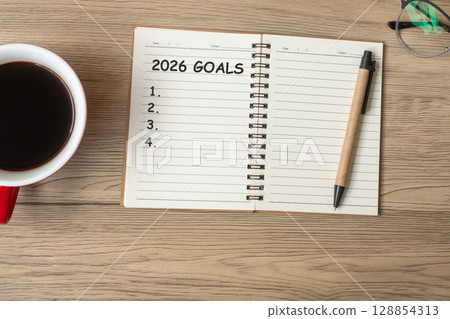 2026 GOAL with notebook, black coffee cup and pen on wood table, Top view and copy space. Happy New Year, Resolution, To do list, Strategy and Plan concept 2026 GOAL with notebook, black coffee cup and pen on wood table, Top view and copy space. Happy New Year, Resolution, To do list, Strategy and Plan concept 128854313
