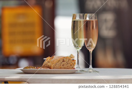 Sparkling Wine and Bread at Outdoor Event Sparkling Wine and Bread at Outdoor Event 128854341