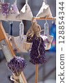 Handmade Lavender Decoration With Dried Herb Bundles and Fabric Pouches 128854344