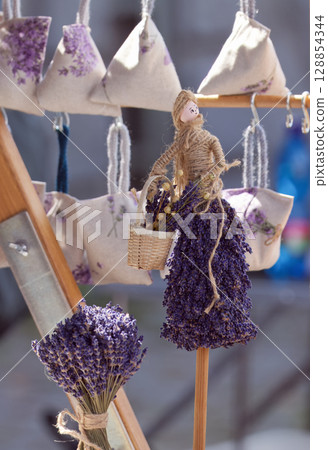 Handmade Lavender Decoration With Dried Herb Bundles and Fabric Pouches Handmade Lavender Decoration With Dried Herb Bundles and Fabric Pouches 128854344