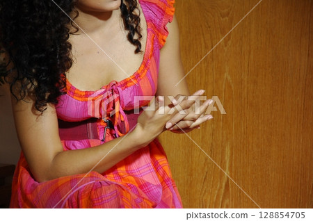 Elegant Indian Woman in Traditional Attire with Sensual Grace 128854705