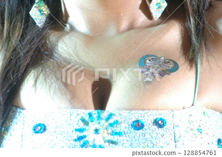 Elegant Indian Woman in Traditional Attire with Sensual Grace 128854761