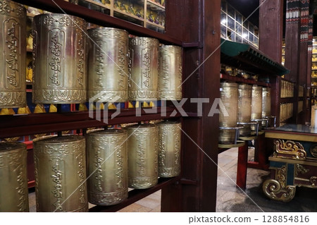 Prayer wheels at the Gandan Monastery in Ulaanbaatar Prayer wheels at the Gandan Monastery in Ulaanbaatar 128854816