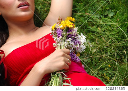 Elegant Indian Woman in Traditional Attire with Sensual Grace 128854865
