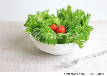 Fresh frilly lettuce salad Fresh frilly lettuce salad 128854891