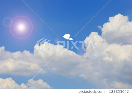 Paper plane flying in the sky 128855042