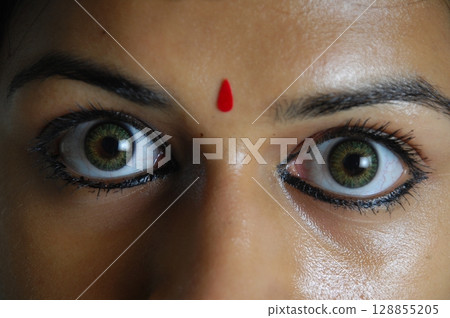 Mesmerizing Eyes of an Indian Female Model Mesmerizing Eyes of an Indian Female Model 128855205