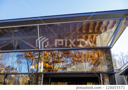 Autumn scenery decorating the large glass windows 128855571