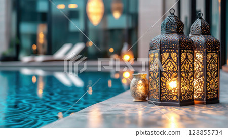 Elegant lanterns by serene pool, creating tranquil atmosphere 128855734