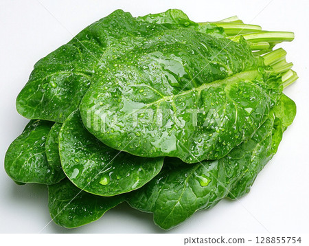 Fresh spinach leaves with water droplets on white background 128855754