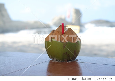 Relaxing Beach Vibes with Fresh Coconut Relaxing Beach Vibes with Fresh Coconut 128856086