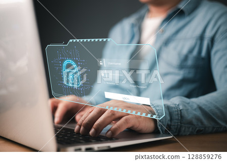 businessman safeguards personal data on a laptop, featuring a virtual screen with a lock icon, symbolizing cybersecurity, privacy protection, and secure internet network technology in the digital age. 128859276