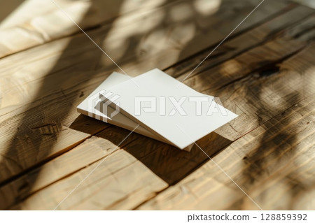 Business card mockup placed on a wooden table Business card mockup placed on a wooden table 128859392