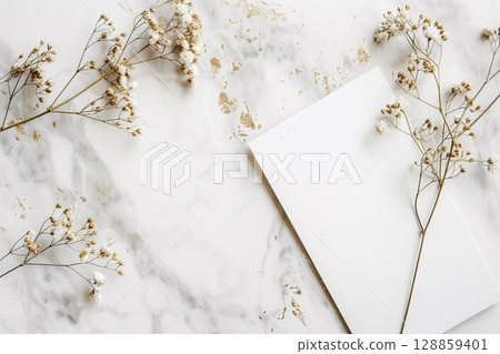 Marble, dried flowers and a message card 128859401