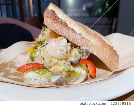 Shrimp and avocado baguette sandwich (open-faced sandwich) 128859516