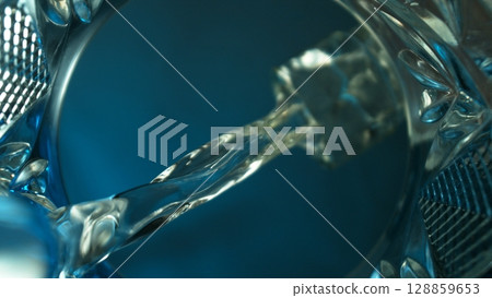 Pouring Vodka into Glass, Macro Shot. Unique Composition Shot from Inside of the Glass. Pouring Vodka into Glass, Macro Shot. Unique Composition Shot from Inside of the Glass. 128859653