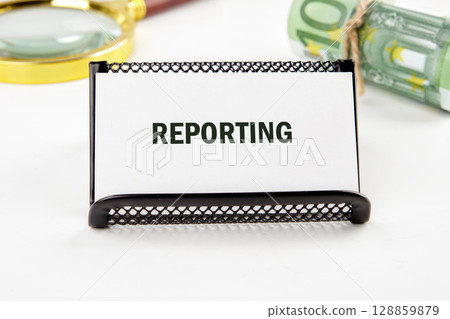 Concept word REPORTING. Checklist business performance monitoring concept Concept word REPORTING. Checklist business performance monitoring concept 128859879