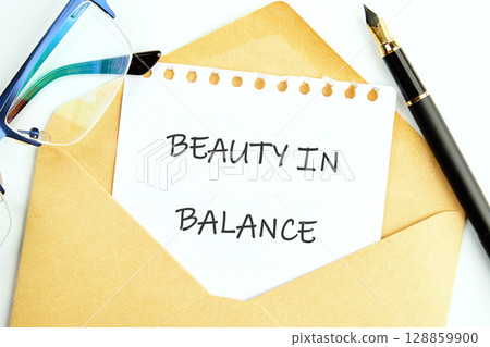 The conceptual phrase BEAUTY IN BALANCE, self care concept copy space 128859900