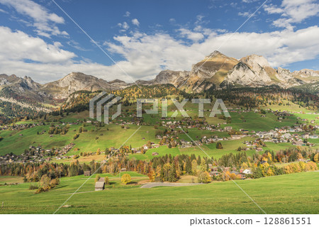 View of Wildhaus and the Alpstein Mountains with Saentis Peak, Toggenburg, Switzerland View of Wildhaus and the Alpstein Mountains with Saentis Peak, Toggenburg, Switzerland 128861551