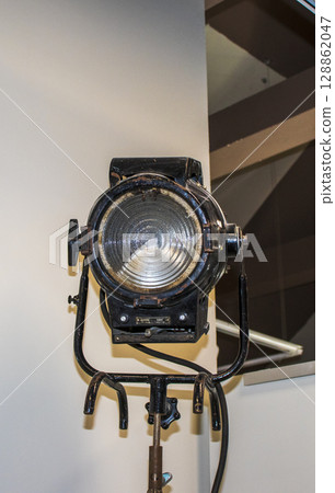 Shot of the old, vintage light projector used during movie production Shot of the old, vintage light projector used during movie production 128862047
