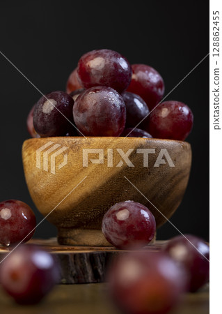 wet pink grapes closeup, clean wet grapes safe for eating, close up wet pink grapes closeup, clean wet grapes safe for eating, close up 128862455